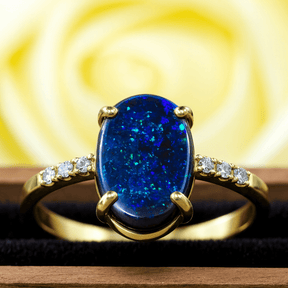 Black Opal Goldring Blau