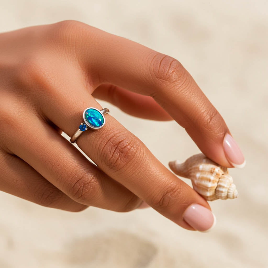Schwarzer Opal und Saphir Ring Frau