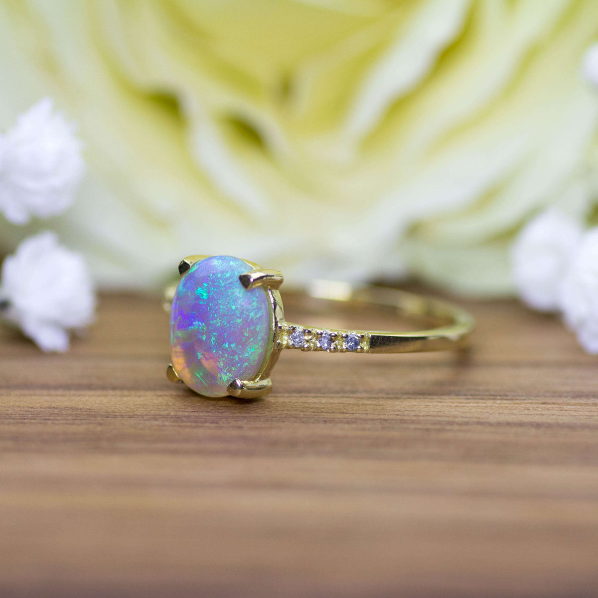 Verlobungsring Gold dunkler Opal Diamanten